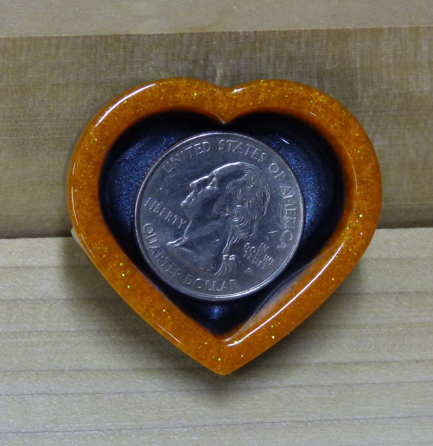 Set of four resin silver black and orange heart shaped dishes 