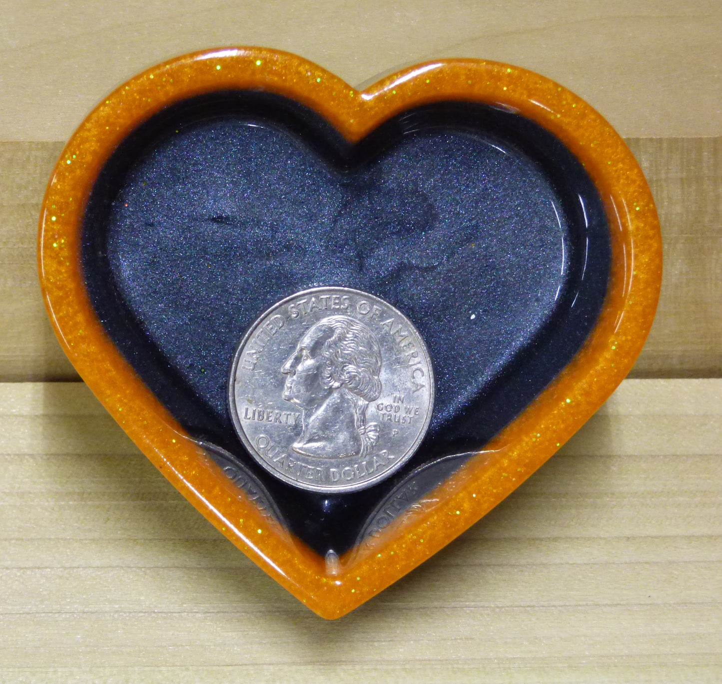 Set of four resin silver black and orange heart shaped dishes 