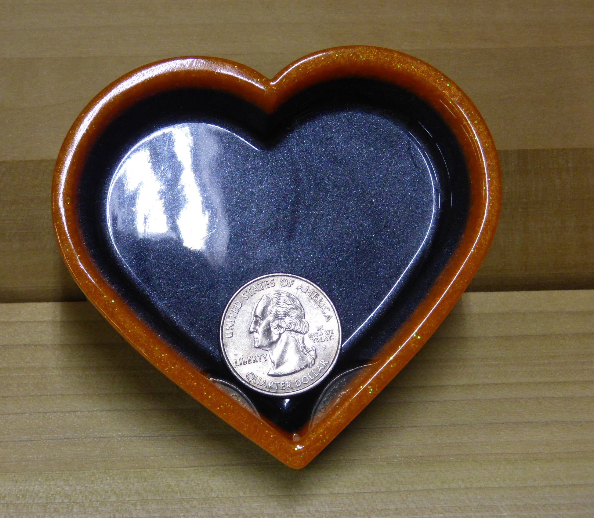 Set of four resin silver black and orange heart shaped dishes