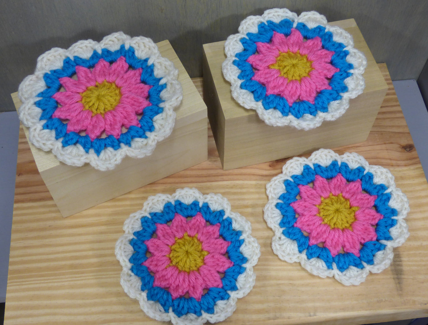 Hand Crocheted Coasters Four Piece Set  White, Blue, Pink, and Yellow