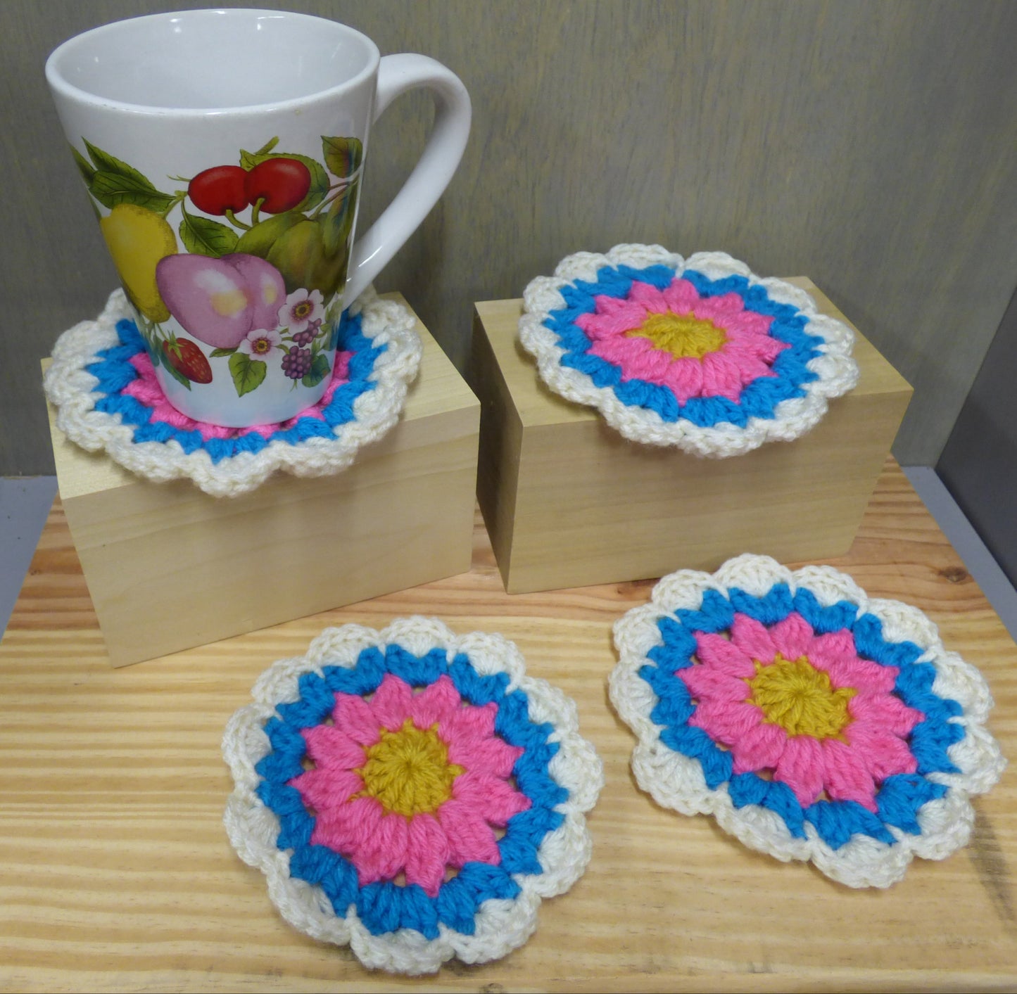 Hand Crocheted Coasters Four Piece Set  White, Blue, Pink, and Yellow