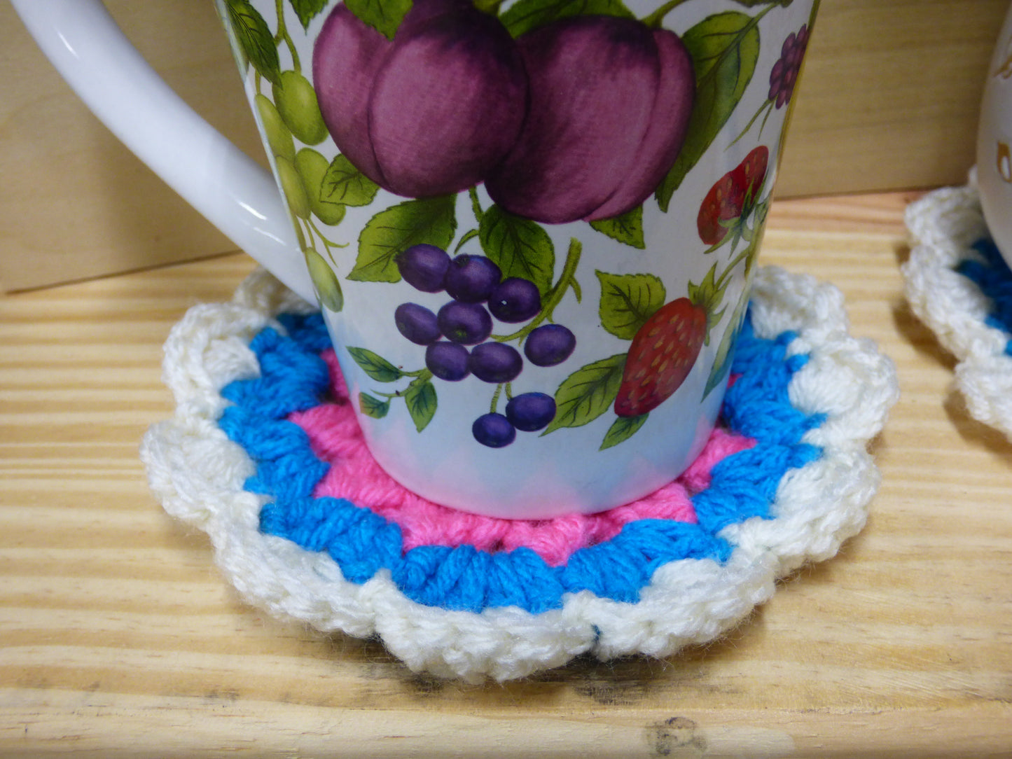 Hand Crocheted Coasters Four Piece Set  White, Blue, Pink, and Yellow