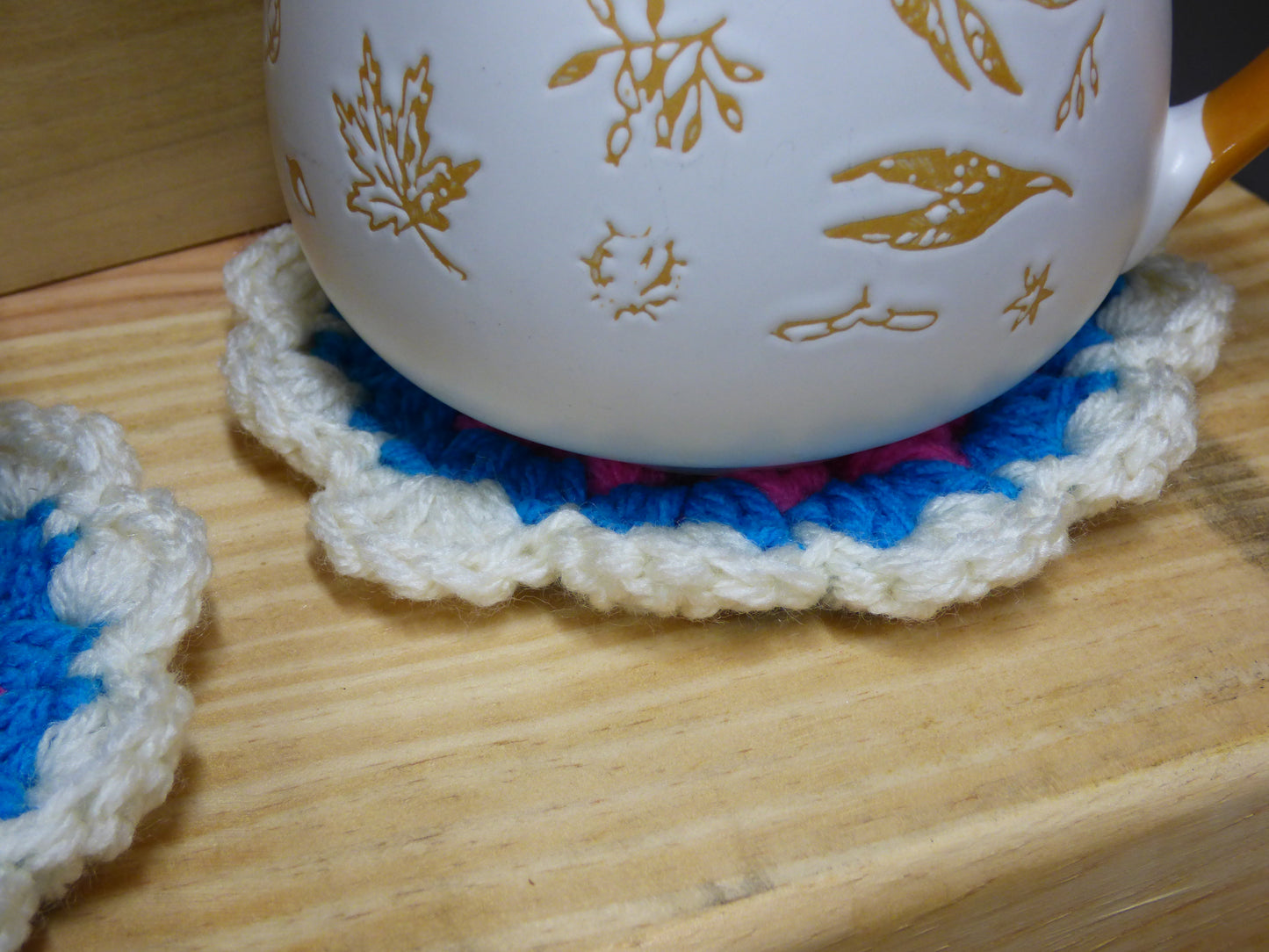Hand Crocheted Coasters Four Piece Set  White, Blue, Pink, and Yellow