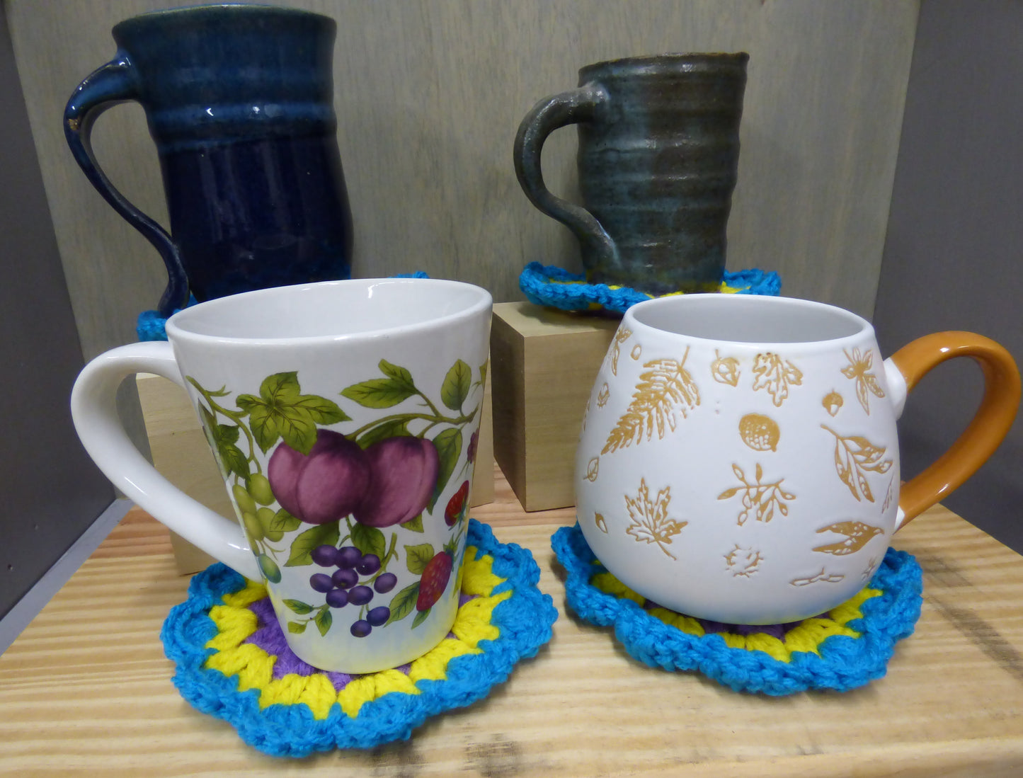 Hand Crocheted Coasters Four Piece Set  Blue, Yellow, Purple, and Red