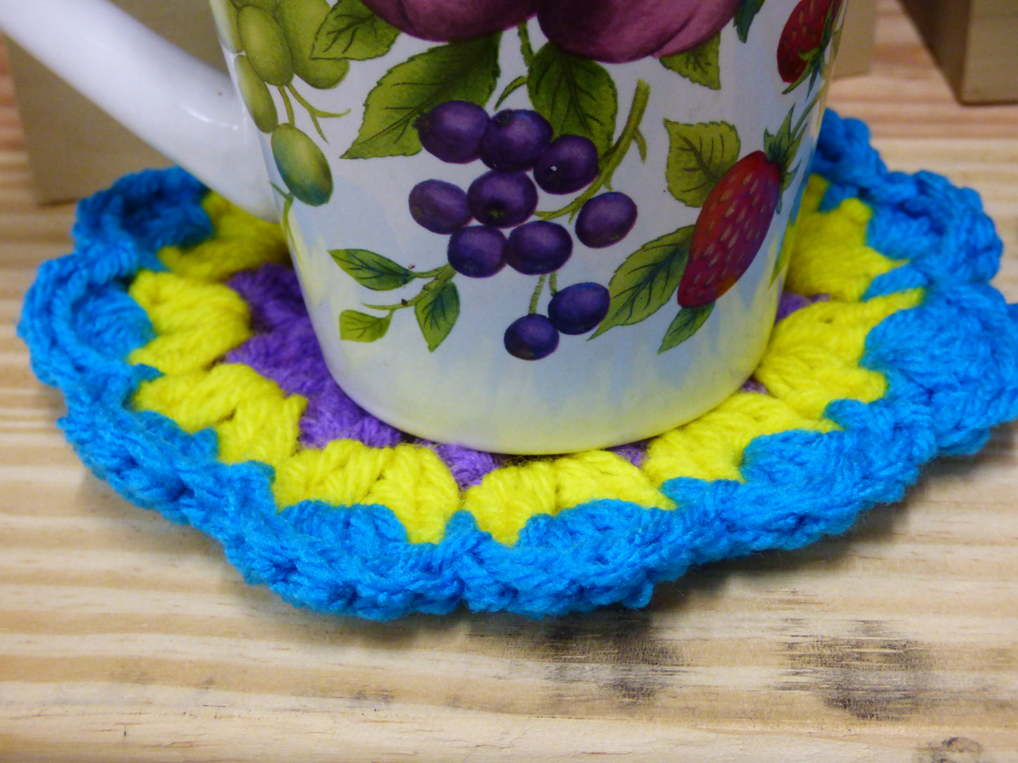 Hand Crocheted Coasters Four Piece Set  Blue, Yellow, Purple, and Red