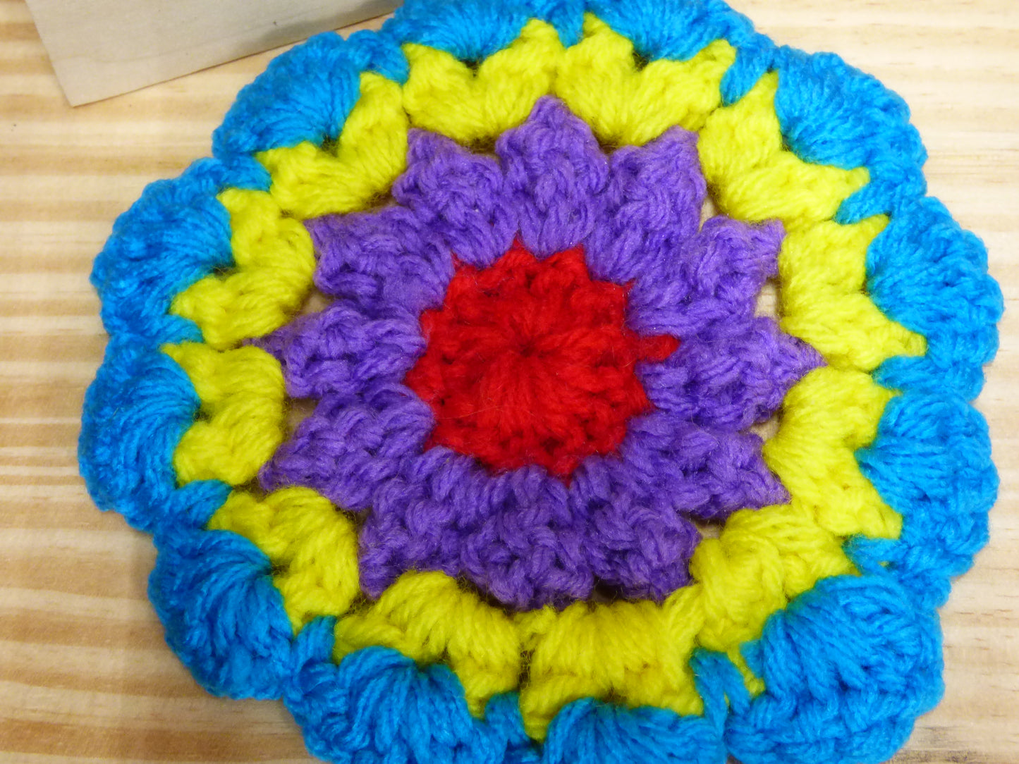 Hand Crocheted Coasters Four Piece Set  Blue, Yellow, Purple, and Red